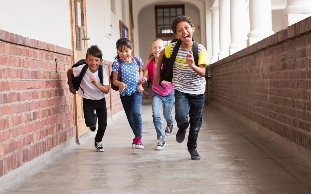 Kids running down hallway
