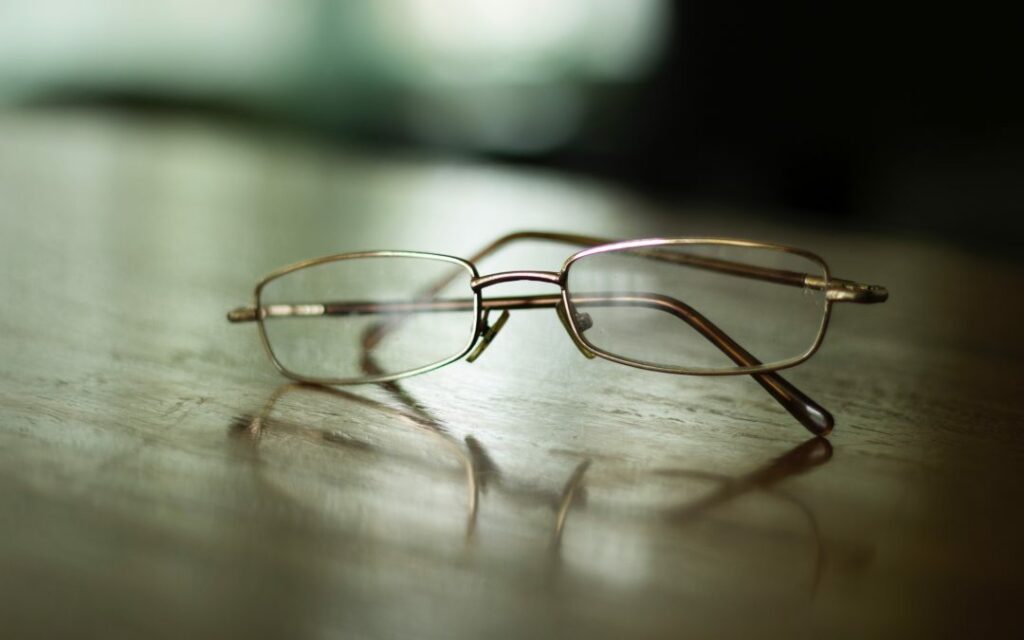 Reading glasses on table