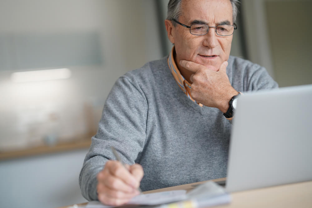 Older man with laptop