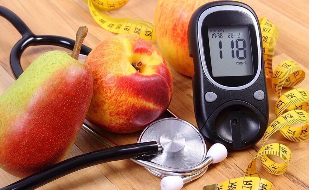 Fruit, stethescope, tape measure, glucose meter