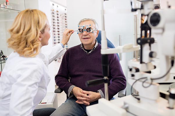 Older man in eye exam room